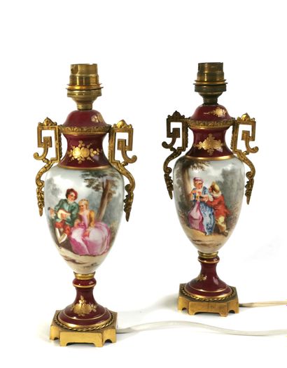 null A pair of Paris porcelain vases decorated with gallant scenes, gilt bronze mounts

Mounted...
