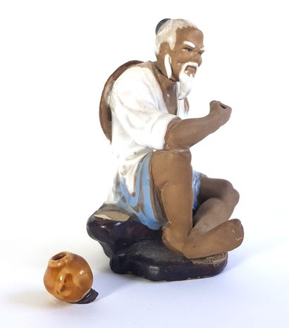 null CHINA 

Fisherman

Enamelled stoneware figurine

H. 12,5 cm

Accident