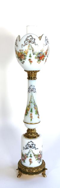null High table lamp simulating a kerosene lamp in opaline glass with enamelled decoration...