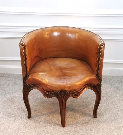 null Moulded and carved beechwood desk chair, faded tan leather upholstery

H. 71...