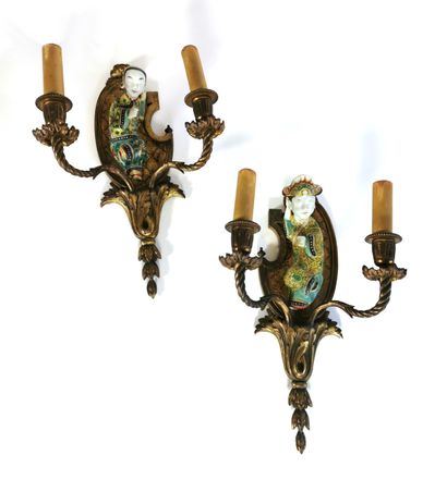 null A pair of ormolu and Chinese porcelain sconces with two arms of light representing...