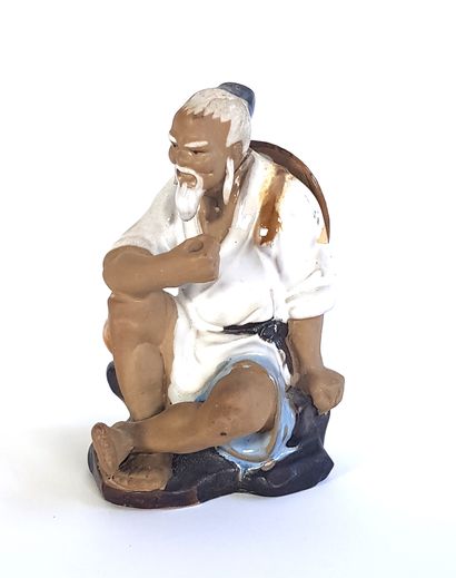 null CHINA 

Fisherman

Enamelled stoneware figurine

H. 12,5 cm

Accident