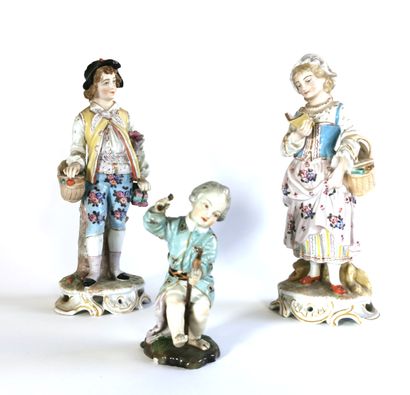 null Three polychrome porcelain figurines

Marks under the bases

H. of the largest:...