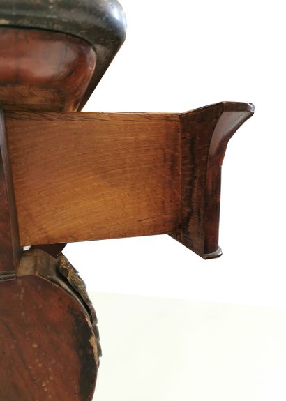null A mahogany, mahogany veneer and burl console. Rectangular in shape, it opens...
