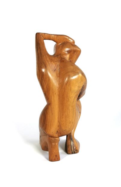 null TRAVAIL DES ANNÉES 80

« Homme accroupi »

Sculpture en bois à la taille directe.

H....