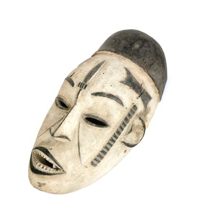 null Masque de style IGBO - Nigeria 

H. 34 x L. 19 cm