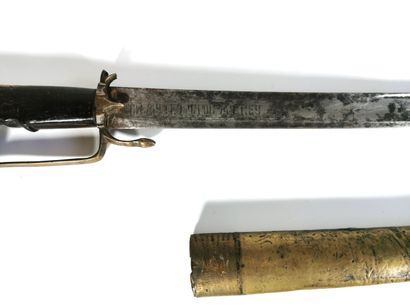 null Nimcha sword, Morocco - 19th century

Wooden handle and blade engraved " POR...