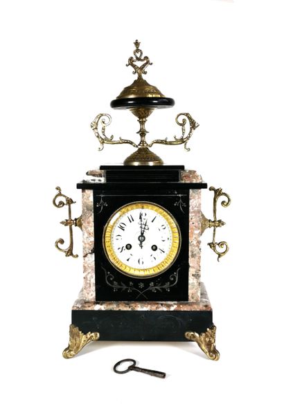 null Marble clock with engraved decoration of foliage, ornaments of chased and gilded...