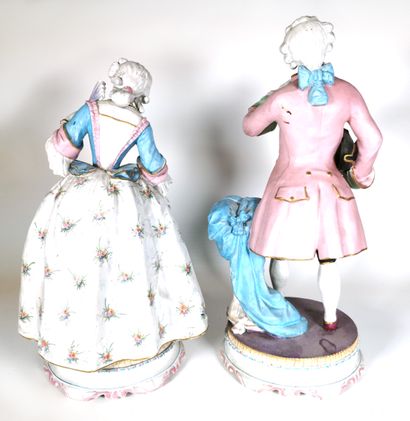 null Pair of polychrome painted cookie figurines representing a couple of gallant

One...
