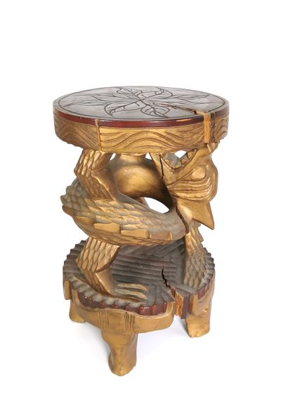 null SOUTHEAST ASIA

Curious stool in carved wood partially gilded, the base composed...