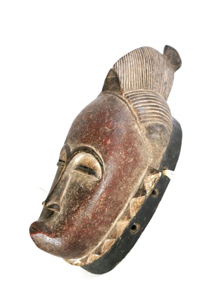 null Baule mask - Ivory Coast 

Decorative mask of style, for use in colonial circles...