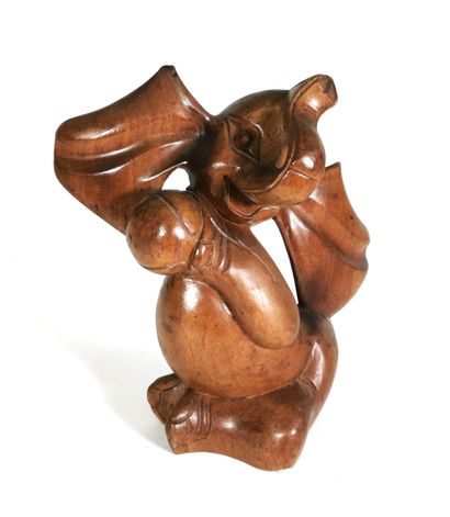 null Statuette d'éléphant rieur en bois

H. 25 cm