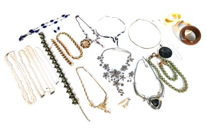 null Set of costume jewelry including: six pearl necklaces, six bracelets, a brooch,...