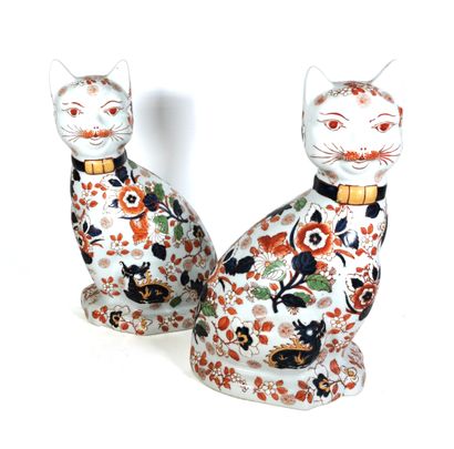 null CHINA or JAPAN

Pair of porcelain cats decorated with floral scrolls and dragons

H....