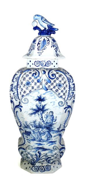 null Earthenware vase decorated in blue monochrome tones with a gallant scene, the...