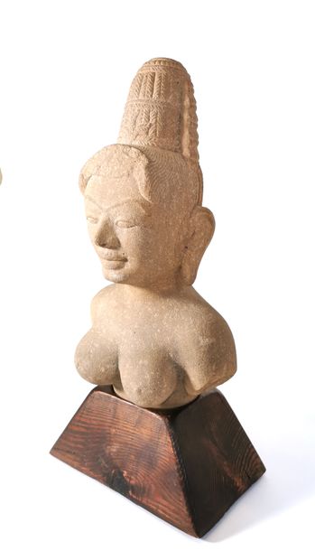 null CAMBODIA - KHMER

Sculpted sandstone bust of a deity with braided hair held...