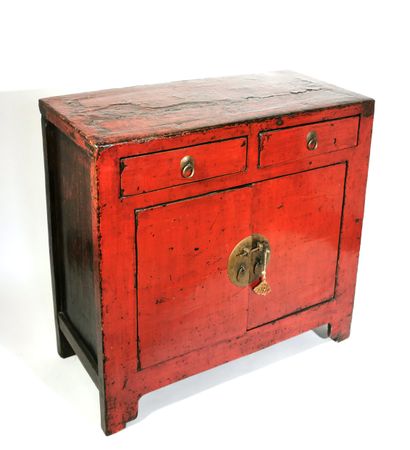 null CHINA, early 20th century

Low sideboard in red lacquered wood opening with...