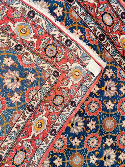 null Velamine carpet, Tehran region (Iran) with mina khani decoration on a blue background...