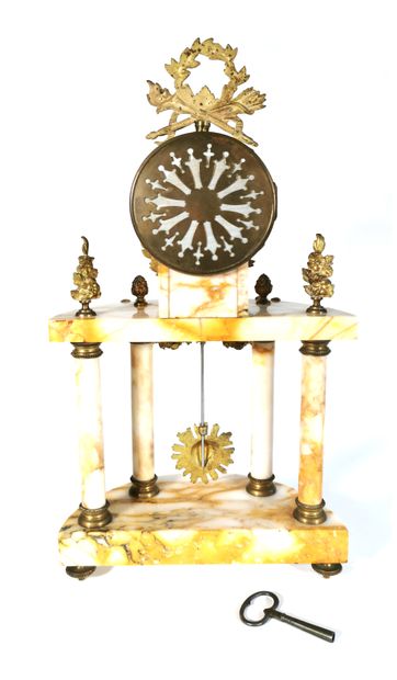null Portico clock in the Louis XVI style in marble and chased and gilded bronze...