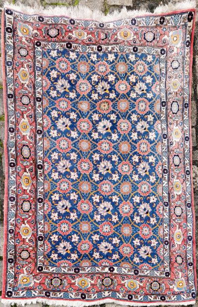null Velamine carpet, Tehran region (Iran) with mina khani decoration on a blue background...