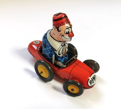 null Mechanical toy, the clown BIMBO on his racing car, JOUSTRA

H. 9 cm