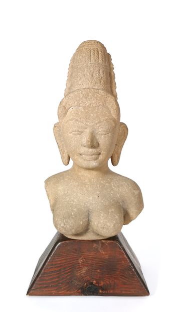 null CAMBODIA - KHMER

Sculpted sandstone bust of a deity with braided hair held...