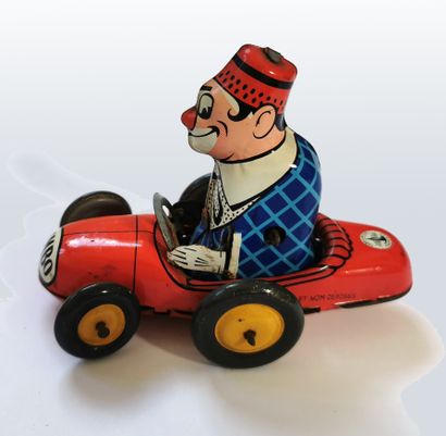 null Mechanical toy, the clown BIMBO on his racing car, JOUSTRA

H. 9 cm