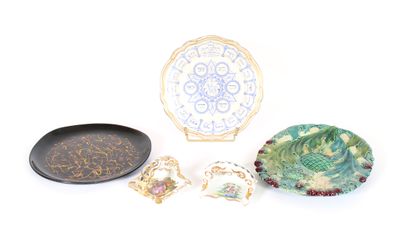 null Set of earthenware pieces including an asparagus dish and two plates

L. between...