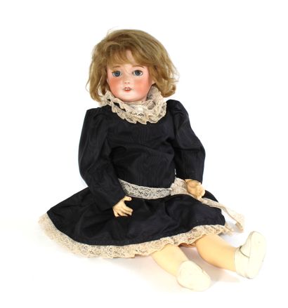 null French doll with bisque head, open mouth revealing her teeth with mobile eyelids,...