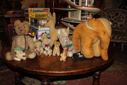 Eleven antique stuffed animals