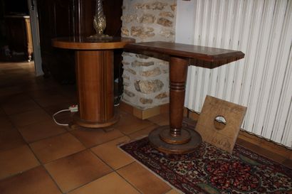 null Two pedestal tables, one of which is Art Deco
