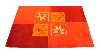 null Carpet in orange tones with leaves decoration

189 x 131 cm