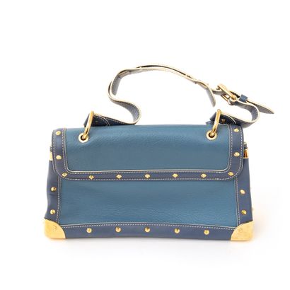null 
** LOUIS VUITTON




Bag "'L'Aimable" in blue suhali leather, golden brass...