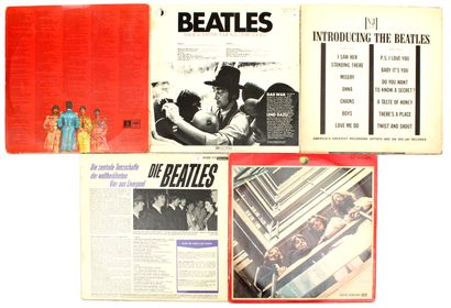 null THE BEATLES

Set of five 33 T. albums including :

- Introducing The Beatles

-...