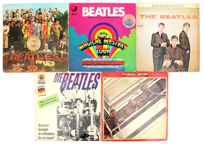 null THE BEATLES

Ensemble de cinq albums 33 T. comprenant :

- Introducing The Beatles

-...