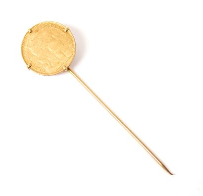 null Tie pin in yellow gold 18K (750 thousandths), decorated with a 10 francs gold...