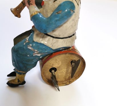null Jouet mécanique allemand figurant un clown clarinettiste sur une grosse caisse,...