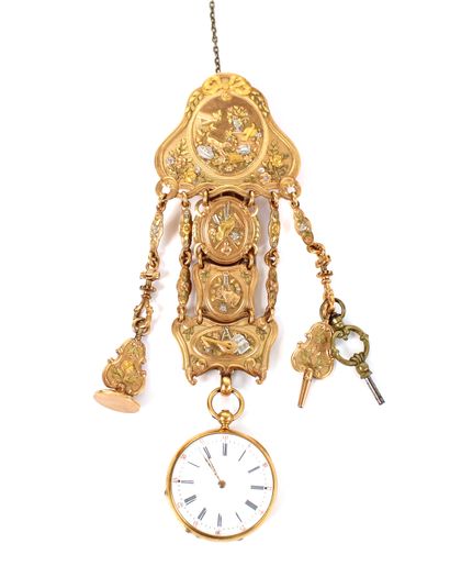 null 
Châtelaine in pompom and its watch in 18K gold (750 thousandths) decorated...