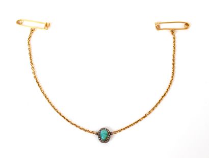 null Jewel of neck chains and pins in yellow gold 18K (750 thousandths) holding a...