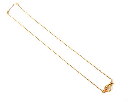 null Chain with its pendant in yellow gold 18K (750 thousandths) with decoration...