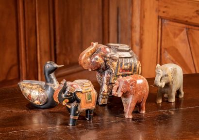 null Animal figurines including two elephants in polychrome carved wood, two elephants...