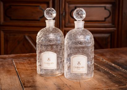 null GUERLAIN House - Habit Rouge

Suite of two 1000 ml molded glass bottles with...