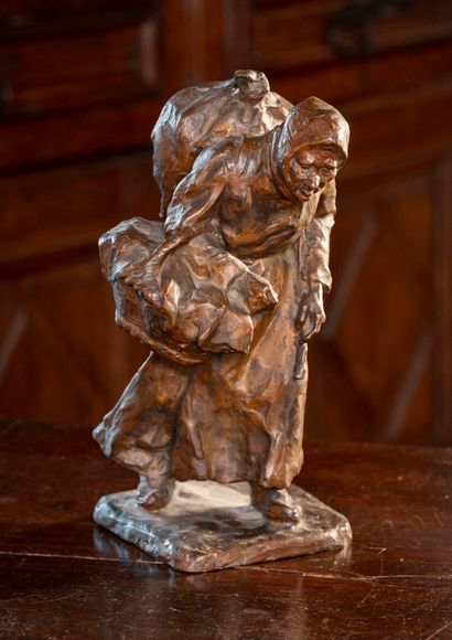 null E. WIRMANN (School of the XXth century)

Old woman with a bundle

Bronze with...
