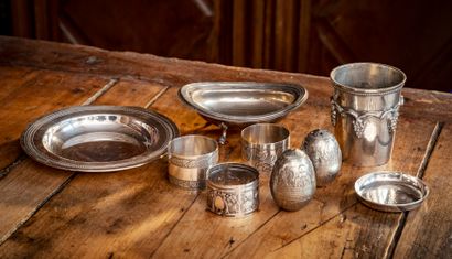 null 
Set of silver-plated metal pieces including a coaster and a dish from the CHRISTOFLE...