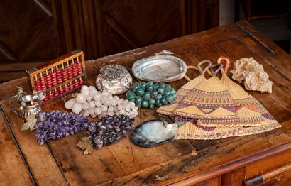 null Set of trinkets including simulated fruits in hard stone, abacus, shells, covered...