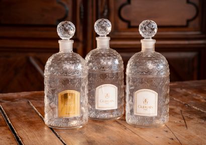 null GUERLAIN House - Habit Rouge

Suite of three 500 ml molded glass bottles with...