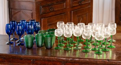null Set of glassware including nine blue tinted wine glasses, six green tinted goblets...