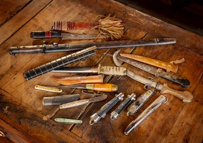 null Fourteen knives or daggers of different materials

One German bayonet marked...