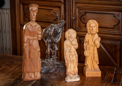 null POPULAR ART

Suite of four figurines in carved wood, three with a pious image...