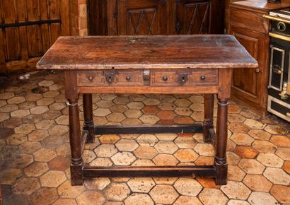 null Table in walnut turned and carved rectangular shape, it opens with two drawers...
